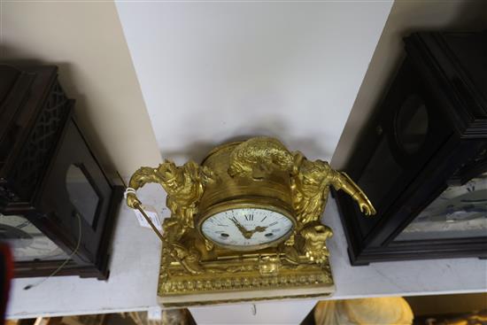 Viger of Paris. A Louis XVI ormolu and white marble mantel clock, height 14in.